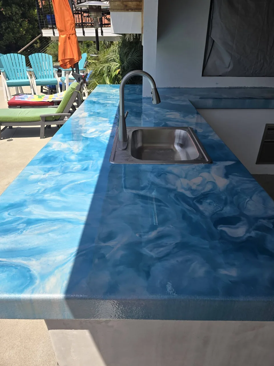 Blue and white epoxy outdoor kitchen countertop