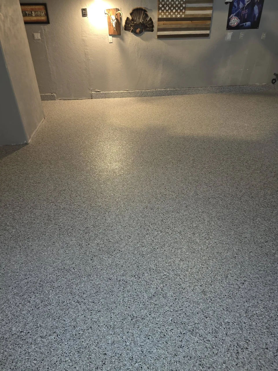 Completed gray flake garage floor
