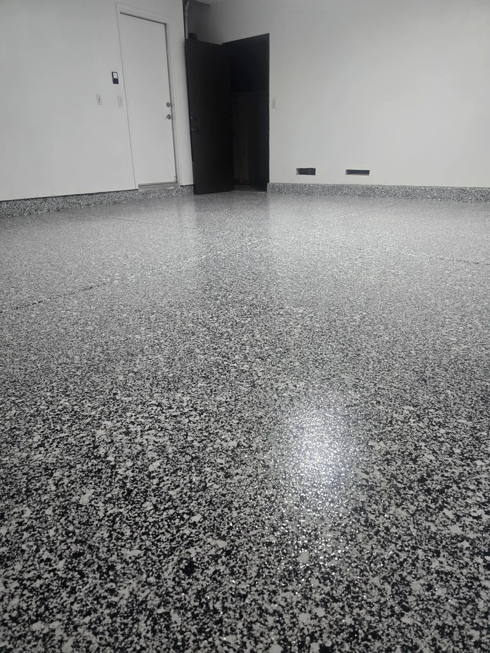 Silver flake floor in a finished garage